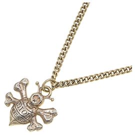 Collier de collaboration Christian Dior Shawn Stussy Doré