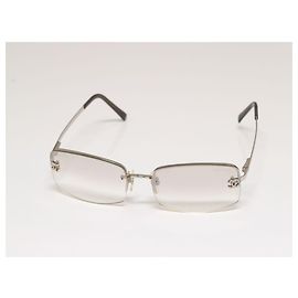 Chanel CC Logo Silver Clear Rimless Rhinestone Sunglasses Silvery
