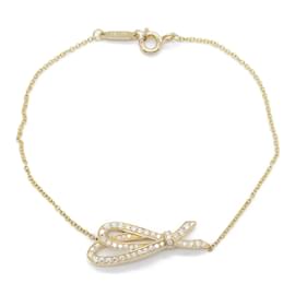 Tiffany & Co-Pulseira charm de laço de diamante Tiffany & Co.-Dourado,Outro