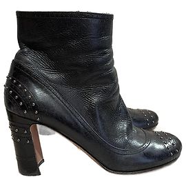 Botas ankle PRADA T.EU 38.5 Couro Preto