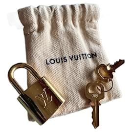 Lucchetto Louis Vuitton in metallo dorato D'oro