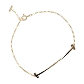 Tiffany & Co-Pulseira charm T Smile da Tiffany & Co.-Outro
