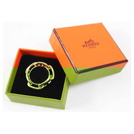 Hermès-Anneau de foulard Dunkel en or Hermes Lukade Chne-Doré