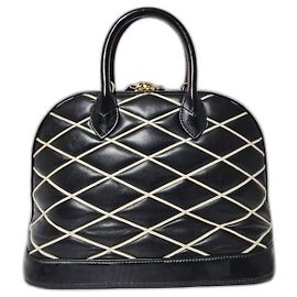LOUIS VUITTON Sac Alma PM en cuir d'agneau Malletage Noir/Blanc Noir Blanc