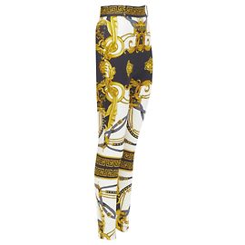 Calças legging com arnês Barocco Rodeo da Versace Dourado Metálico