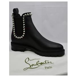 Christian Louboutin-CHRISTIAN LOUBOUTIN black capahutta flat boots-Black
