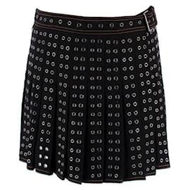 Christian Dior Gonna mini plissettata nera con occhielli Dior Nero