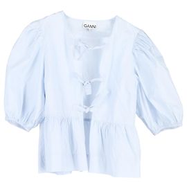 Blusa peplum con lazo Ganni en algodón azul claro Azul Azul claro