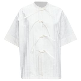 Camisa boxy con cuello mandarín y botón, corbata con logo a rayas de Jil Sander Blanco