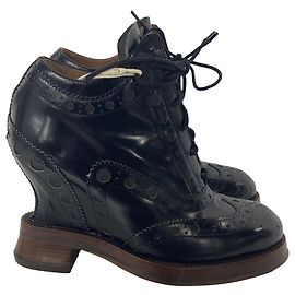 Botas de cuña brogue Spin en cuero negro de Acne Studios Negro