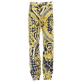 Jeans Medusa stud Barocco selvagem Versace Dourado Metálico