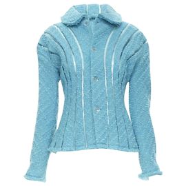 Jaqueta espacial de tweed bouclê com acabamento em PVC de Junya Watanabe Azul