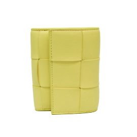 Bottega Veneta CASSETTE Cartera de cuero de tres pliegues Amarillo