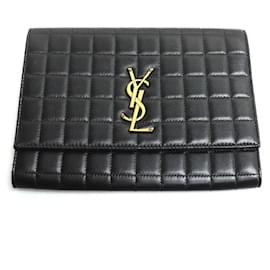 Yves Saint Laurent Bolso clutch de cuero con solapa Saint Laurent Negro