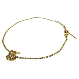 Yves Saint Laurent-Yves Saint Laurent Opium Monogram Twist Cassandra Bracelet-Golden