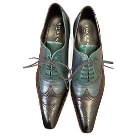 Heschung Richelieu scarpe stringate in pelle nero e blu Nero Blu