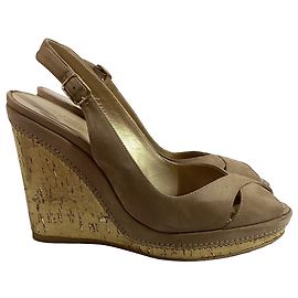Stuart Weitzman Escarpins à talon compensé à bout ouvert en daim marron Marron