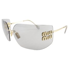 Gafas de sol Miu Miu Runway SMU54Y de plástico dorado Castaño
