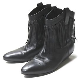Yves Saint Laurent Botas western de cuero con flecos Saint Laurent Otro