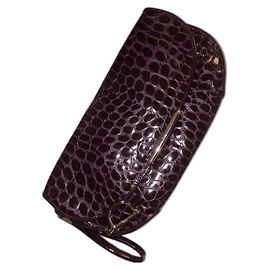 Christian Dior Clutch de charol con estampado de cocodrilo morado Dior Morado oscuro