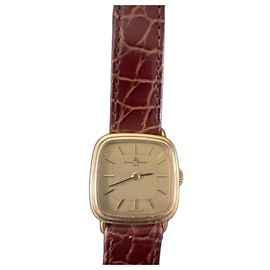 Baume & Mercier Reloj de oro amarillo de 18K Dorado
