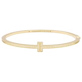 Tiffany & Co-Bracelete Tiffany & Co., 'Tiffany T', ouro amarelo, diamantes.-Outro
