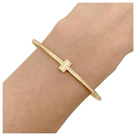Tiffany & Co-Bracelete Tiffany & Co., 'Tiffany T', ouro amarelo, diamantes.-Outro