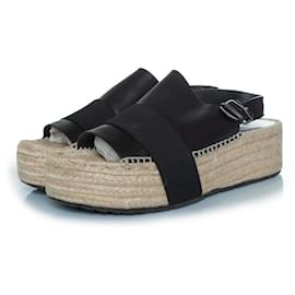 Balenciaga-Flat leather raffia sandals-Black