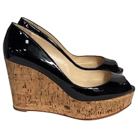 Christian Louboutin- Christian Louboutin Coroclic Peep-Toe Wedge Pumps in Black Leather-Black