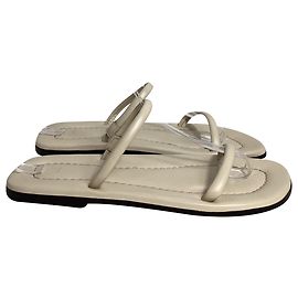 Totême City Flat Sandals in Cream Leather White Cream