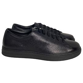 Sneakers basse martellate Prada in pelle nera Nero