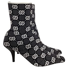Botas de punto Gucci de 75 mm con G entrelazado en tejido de punto negro Negro