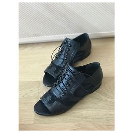 GIVENCHY Mules e tamancos T.EU 36 Couro Preto