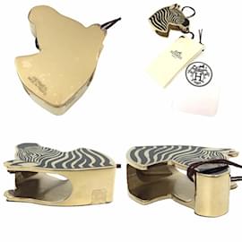 Hermès-Anneau de foulard Hermès en noir et or-Noir,Doré