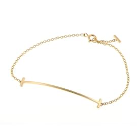 Tiffany & Co-Pulseira charm T Smile da Tiffany & Co.-Outro