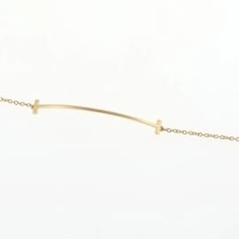 Tiffany & Co-Pulseira charm T Smile da Tiffany & Co.-Outro
