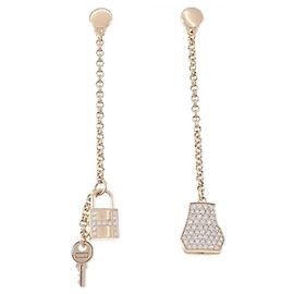 Hermès Boucles d'oreilles en crochet Hermes Kelly Autre