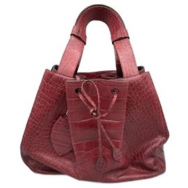 Alaïa Bolsa tote de couro com estampado de crocodilo Outro