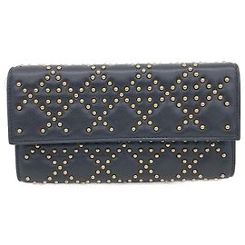 Clutch Cannage Stud da Christian Dior e bolsa transversal Preto