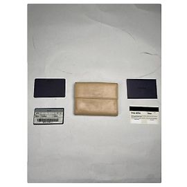 Bolsa pequena de couro bege da Prada Bege