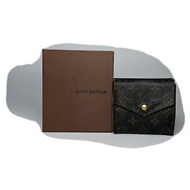Louis Vuitton Koala Brown Leather Wallet Brown