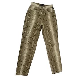 Pantaloni in cotone dorato Versace D'oro