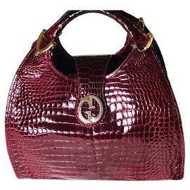 Bolsa Gucci em couro de crocodilo vermelha Vermelho