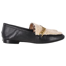 Mocassins conversíveis em couro preto Coach Helena Sheared Preto
