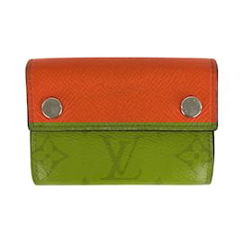 Louis Vuitton-Carteira compacta Discovery Monogram Taigarama Louis Vuitton-Laranja