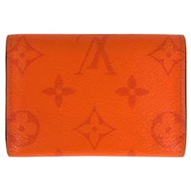 Louis Vuitton-Carteira compacta Discovery Monogram Taigarama Louis Vuitton-Laranja