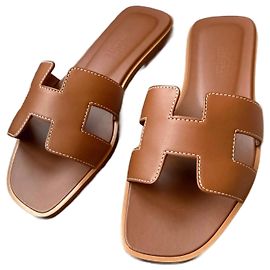 Hermès Orã Marrom