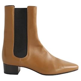 The row Brown leather boots Brown