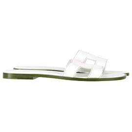 Hermès-Hermès Oran Slip-On Flat Sandals in White Leather-White