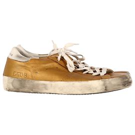 Baskets perforées Golden Goose Superstar en cuir doré Doré
